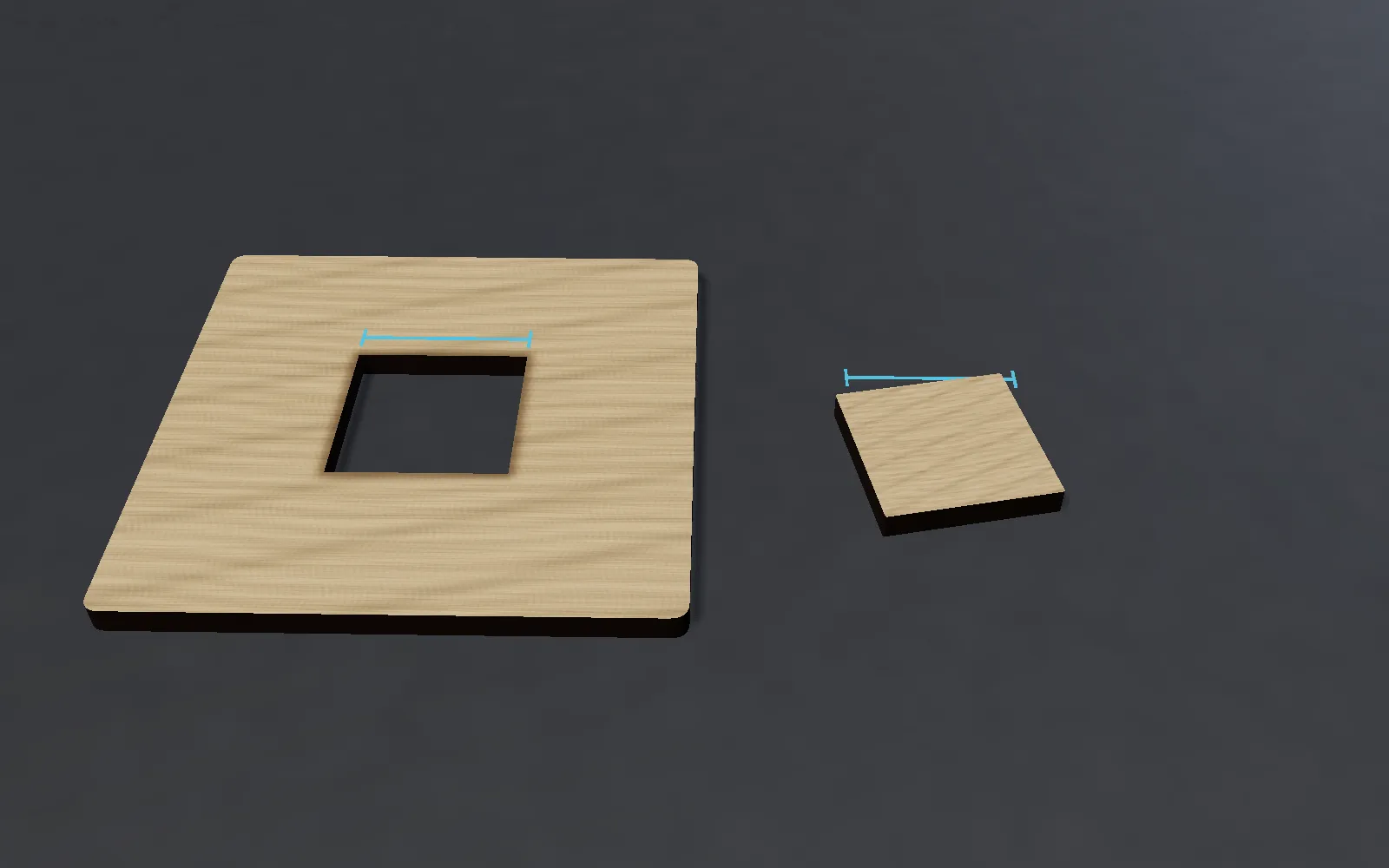 Kerf test in plywood: a 20 mm square cut out, with the square piece beside its hole; the blue marks compare the width of piece and hole